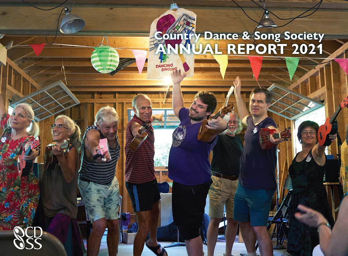 Ukulele players at summer camp pose for the CDSS Annual Report cover
