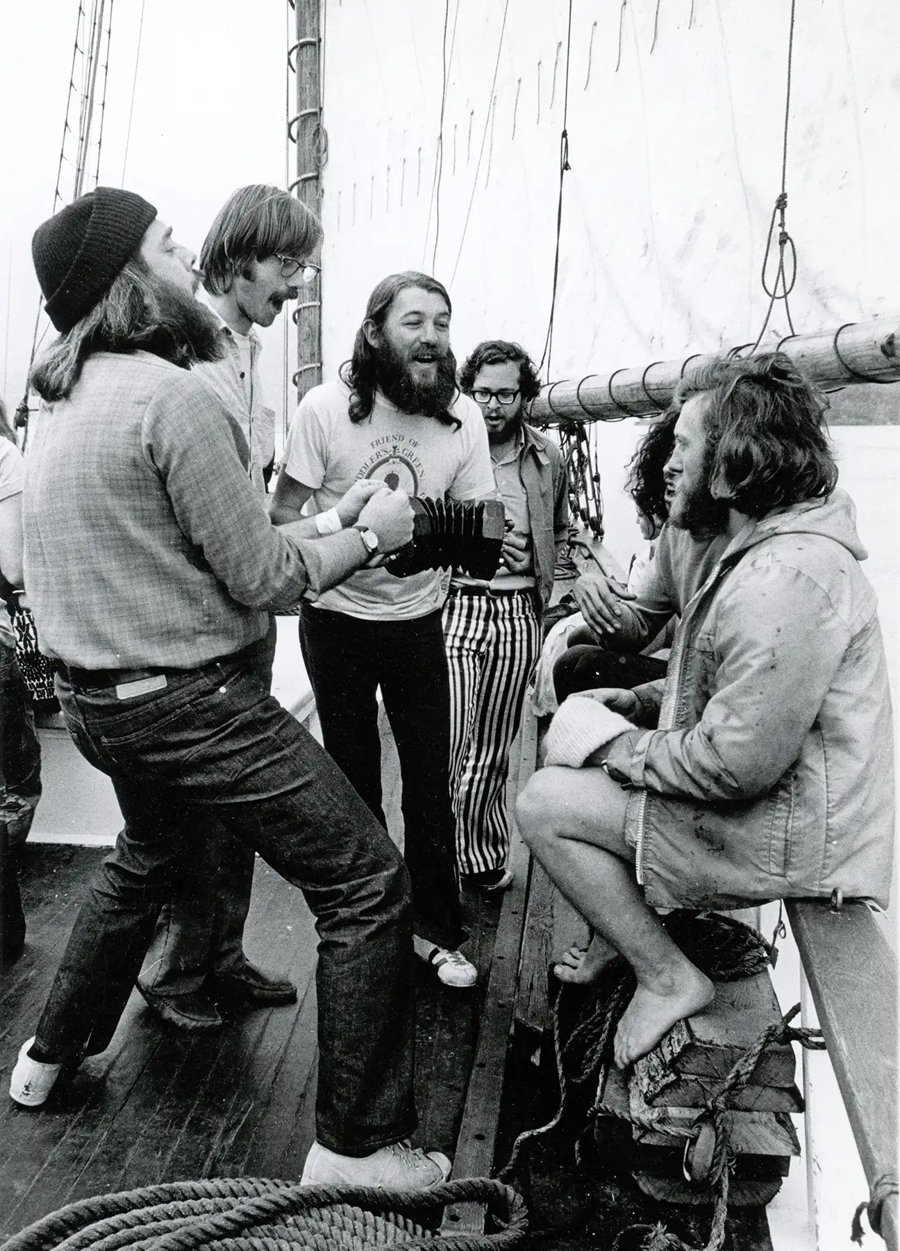 John Roberts, Tony Barrand, and others on a boat. Photo courtesy of Andy Davis.