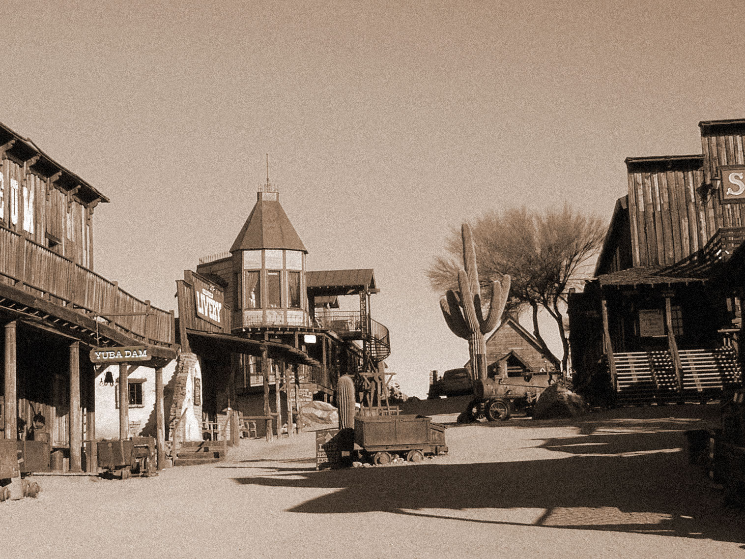 A town in the Old West with a sign reading 'Yuba Dam'