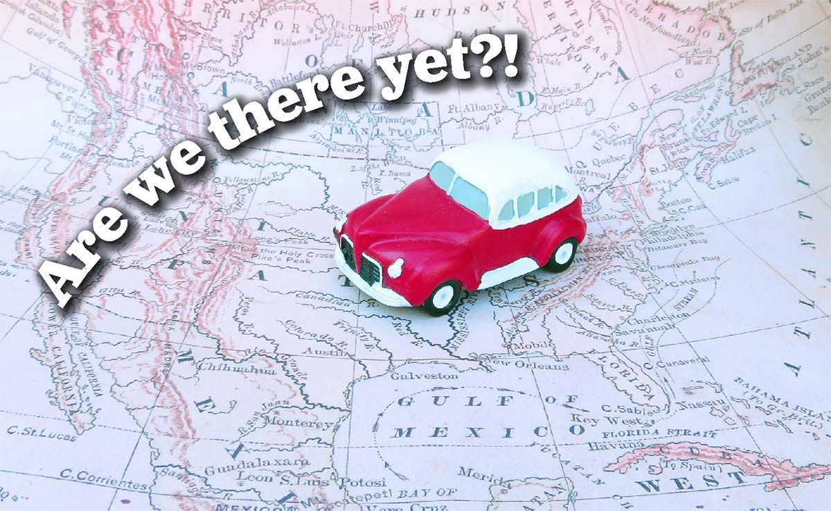 Toy car on a map, with text reading 'Are we there yet?!'