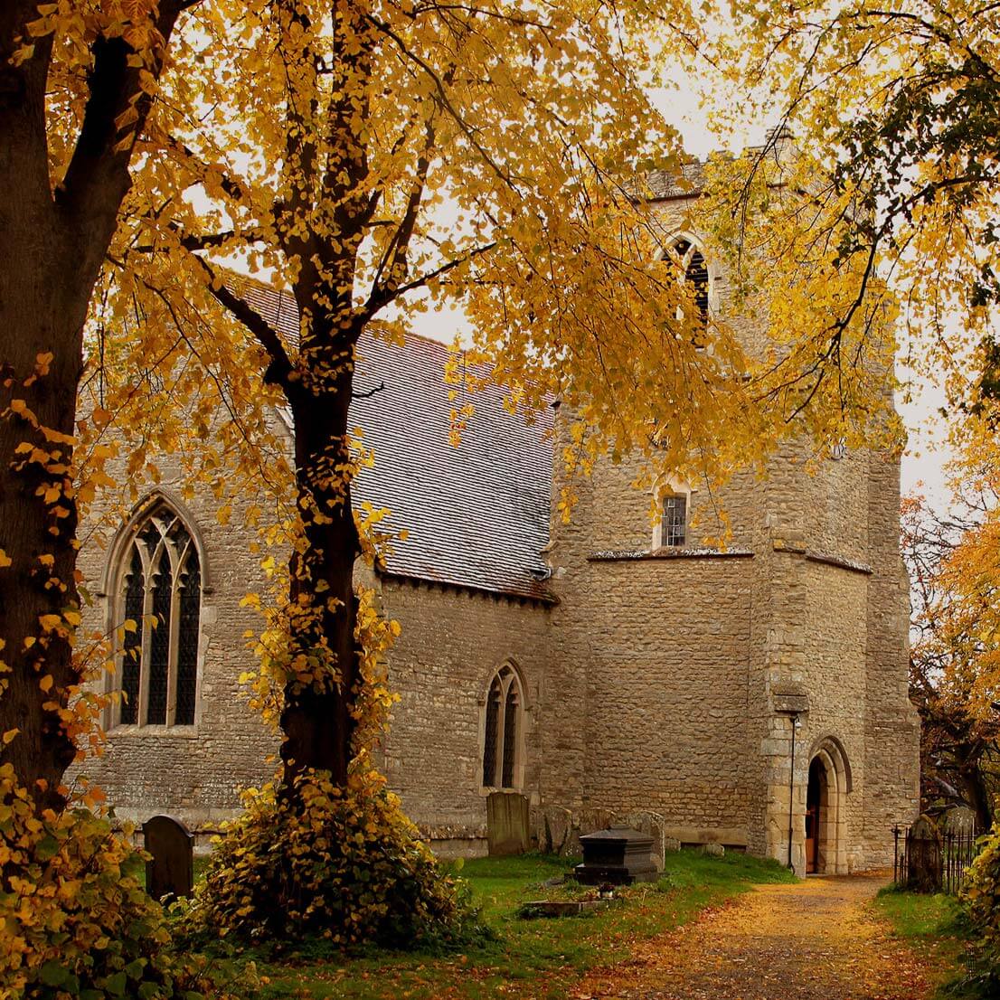 St. Catherine's Church in Towersey among autumn leaves